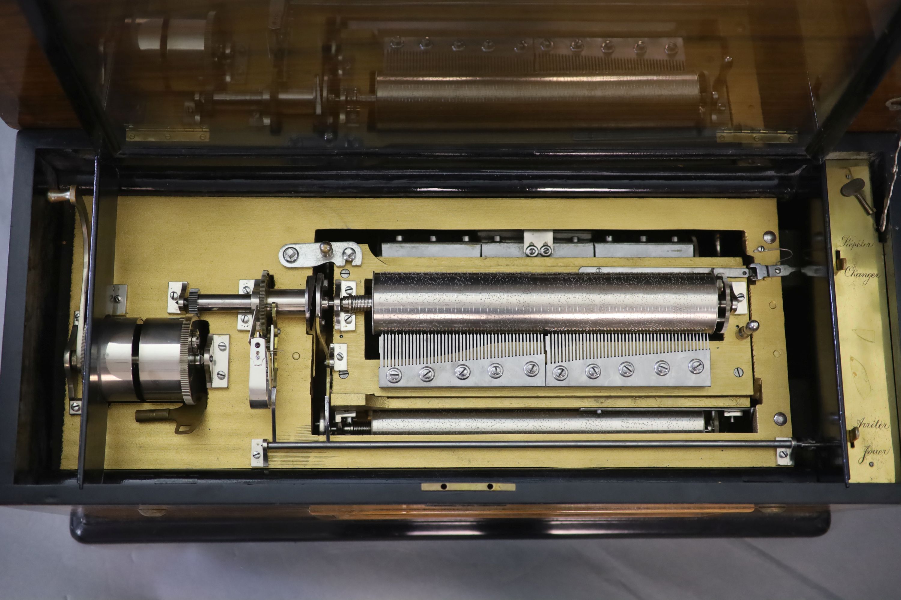 A rare Swiss quatre-revolver cylinder musical box, late 19th century 88 x 36cm, 38cm high.